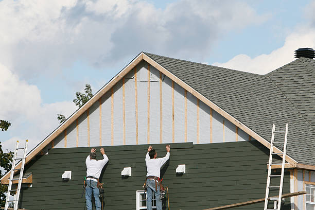 Professional Siding Installation technician working in Lafayette, CO